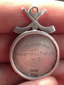 Detail on back of medal showing the 1913 date and jewellers stamp.